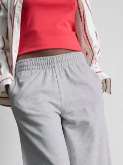 Joggers de pernera ancha plisados con algodón