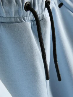 Joggers reforzados con bajos ajustados