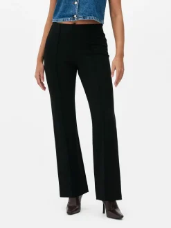 Leggings acampanados de talle medio en punto roma