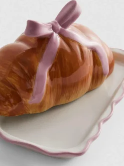 Mantequillera de cerámica en forma de croissant