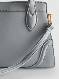 Minibolso con asas