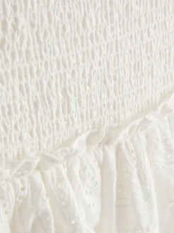 Minifalda bordada de algodón a capas