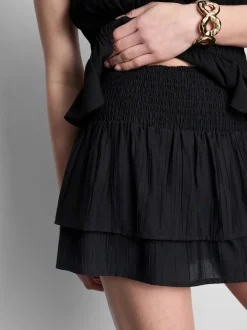 Minifalda fruncida con volantes