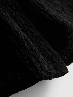 Pantalón corto fruncido con cordón de ajuste