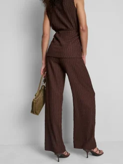 Pantalones anchos con efecto fruncido