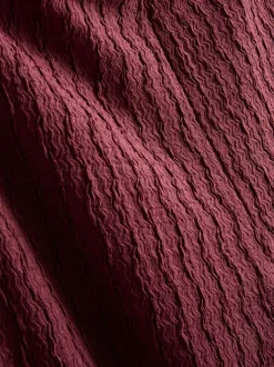 Pantalones anchos con efecto fruncido