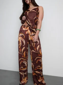 Pantalones anchos de satén arrugado florales