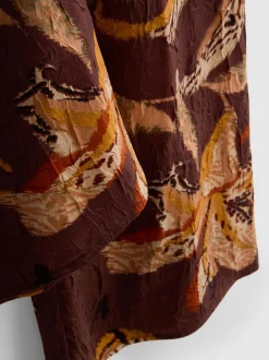 Pantalones anchos de satén arrugado florales