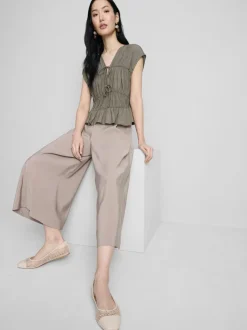Pantalones anchos tipo culotte de talle medio
