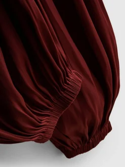 Pantalones bombachos con cintura drapeada