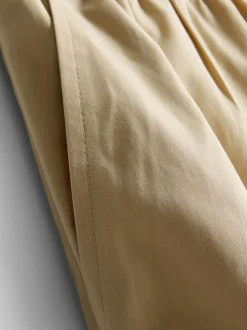Pantalones bombachos con pinzas de tacto suave