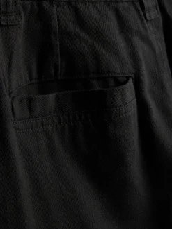 Pantalones chinos de talle medio