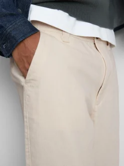 Pantalones chinos holgados de tiro medio