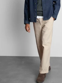 Pantalones chinos holgados de tiro medio