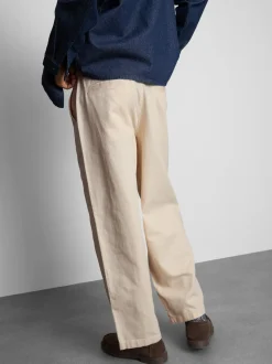 Pantalones chinos holgados de tiro medio
