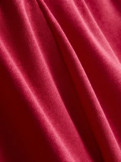Pantalones cortos de algodón con bajo abierto