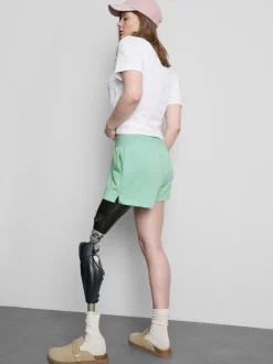 Pantalones cortos de algodón con bajo abierto