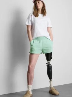 Pantalones cortos de algodón con bajo abierto