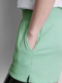 Pantalones cortos de algodón con bajo abierto