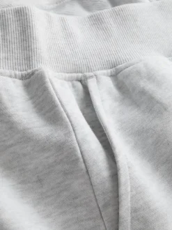 Pantalones cortos de algodón con bajo abierto