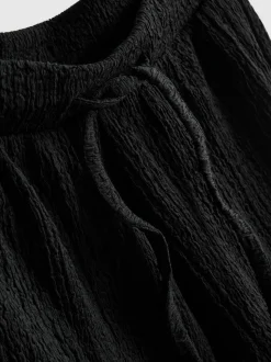 Pantalones cortos texturizados holgados