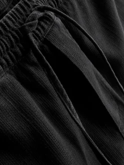 Pantalones cortos texturizados con cordón de ajuste