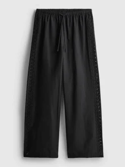 Pantalones de algodón anchos con detalle bordado