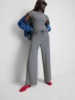 Pantalones de canalé de algodón de pernera ancha