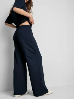 Pantalones de chándal anchos con cordón de ajuste