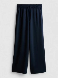 Pantalones de chándal anchos con cordón de ajuste