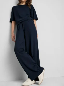 Pantalones de chándal anchos con cordón de ajuste