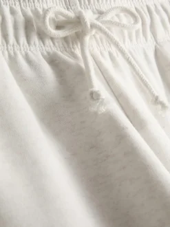 Pantalones de chándal anchos con aplicación