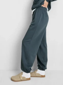 Pantalones de chándal con bajos ajustados en mezcla de algodón