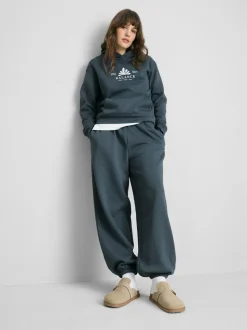 Pantalones de chándal con bajos ajustados en mezcla de algodón