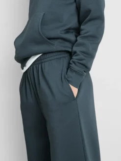 Pantalones de chándal con bajos ajustados en mezcla de algodón