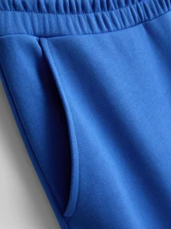 Pantalones de chándal de aeropuerto de pernera ancha