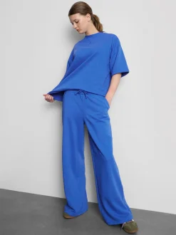 Pantalones de chándal de aeropuerto de pernera ancha