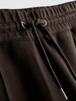 Pantalones de chándal de The Edit de piqué con cordón de ajuste