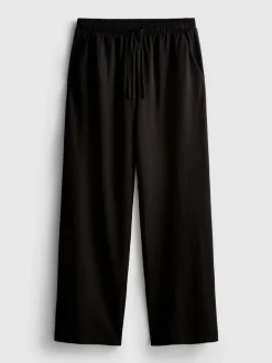 Pantalones de pernera ancha con textura