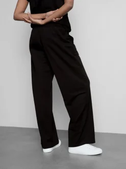 Pantalones de pernera ancha con textura