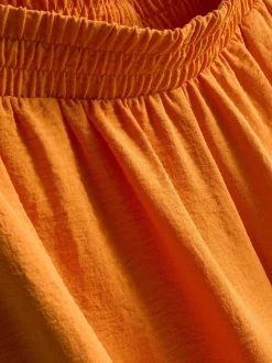 Pantalones de pernera ancha con cintura elástica