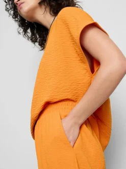 Pantalones de pernera ancha con cintura elástica