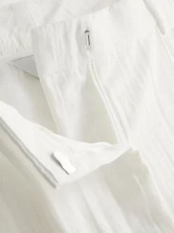 Pantalones de pernera ancha con textura