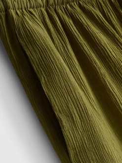 Pantalones de pernera ancha con efecto arrugado