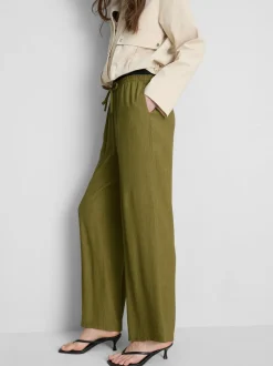 Pantalones de pernera ancha con efecto arrugado