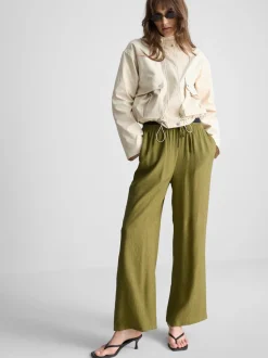 Pantalones de pernera ancha con efecto arrugado