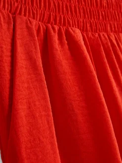 Pantalones de pernera ancha con cintura elástica