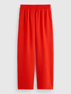 Pantalones de pernera ancha con cintura elástica