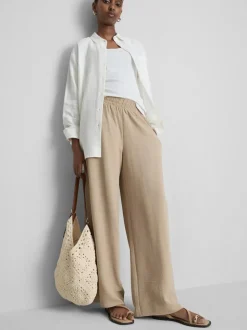 Pantalones de pernera ancha con cintura elástica