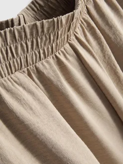 Pantalones de pernera ancha con cintura elástica